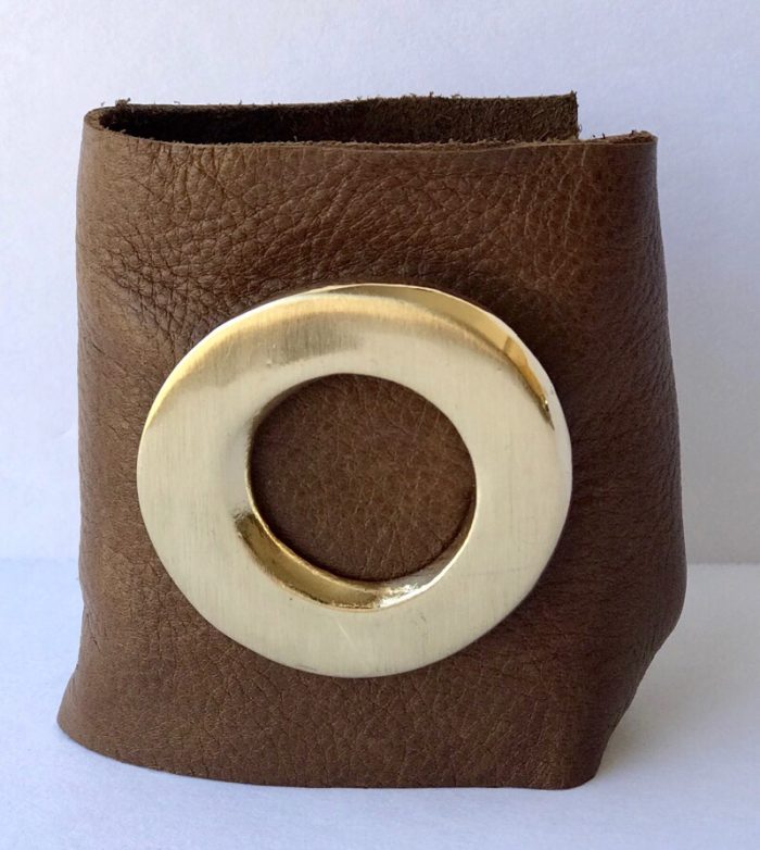 GOLD CIRCLE EMBLEM ON CAMEL LEATHER WRIST CUFF